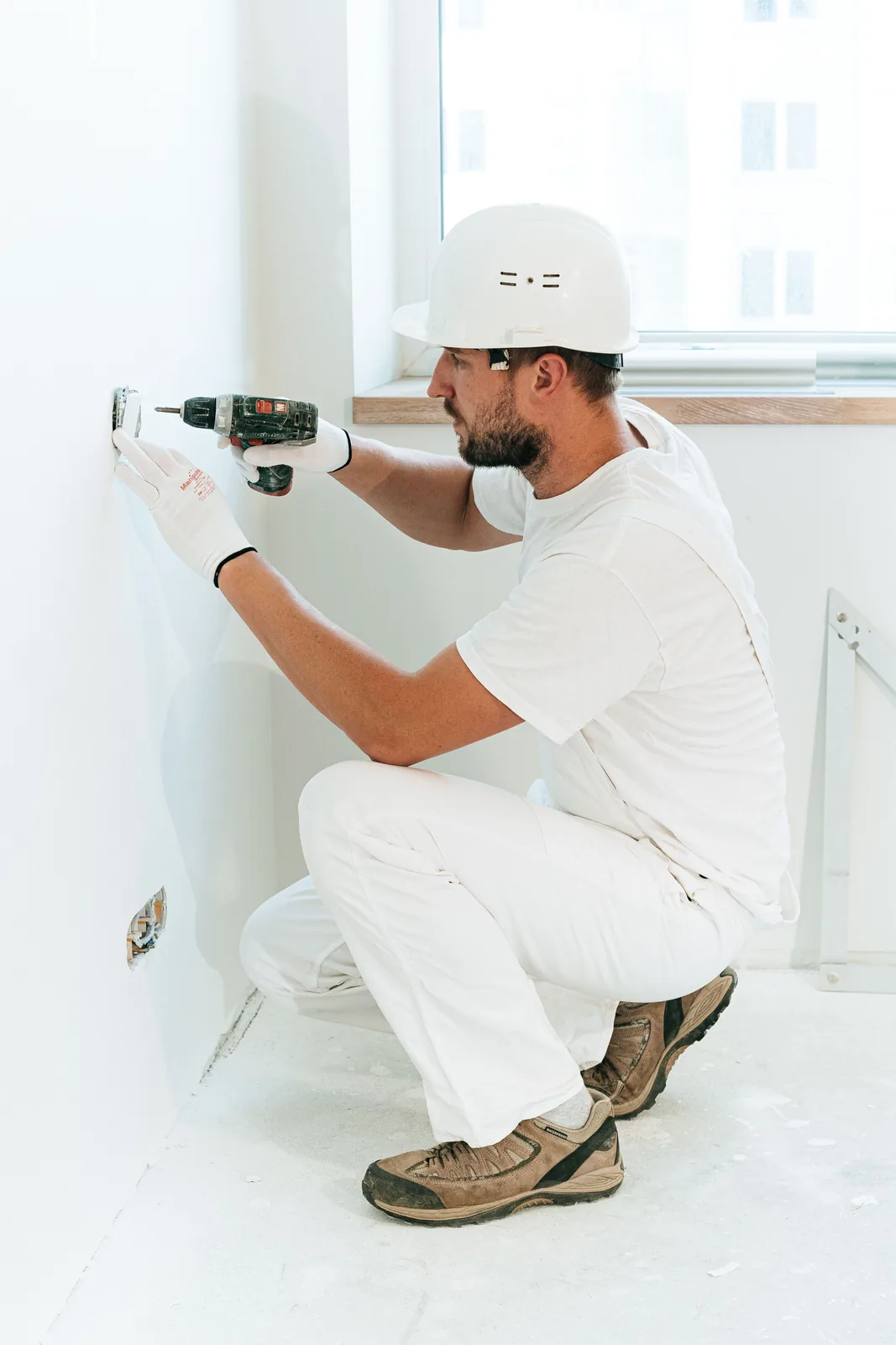 Fixing a socket into a finished wall, for electrician in London