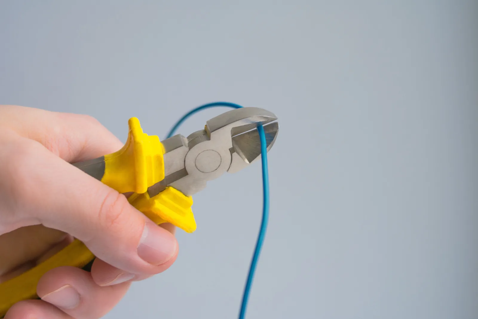 Cutting a conductor to length, for licensed electrician in London